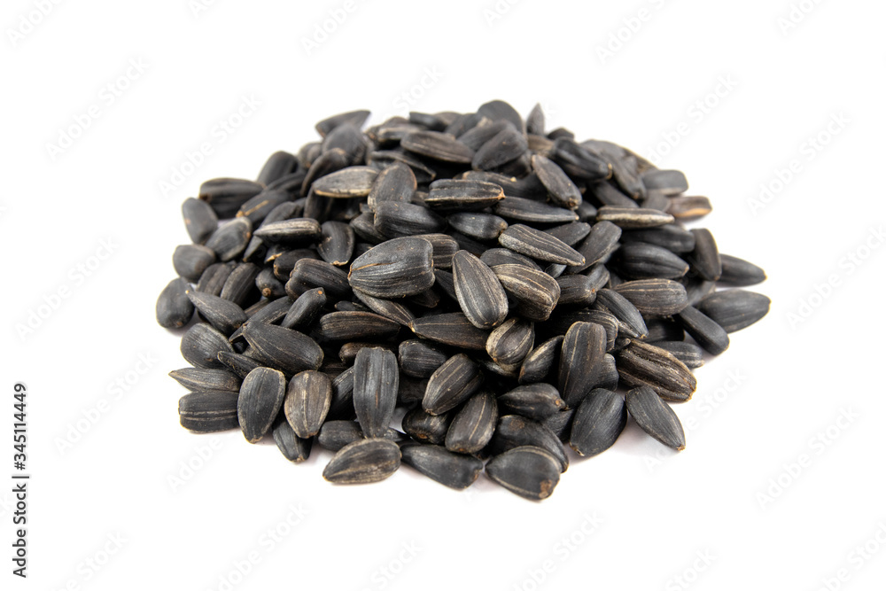 Roasted sunflower seeds white background Roasted sunflower seeds white background