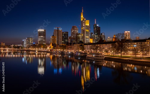 Frankfurt-am-Main, GERMANY- April 11, 2020:  Skyline of Frankfurt, Germany at night. © Alexander