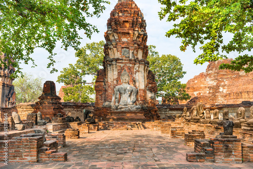 Historical and religious architecture of Thailand - ruins of old Siam capital Ayutthaya. View to brick remains of Wat Mahathat temple