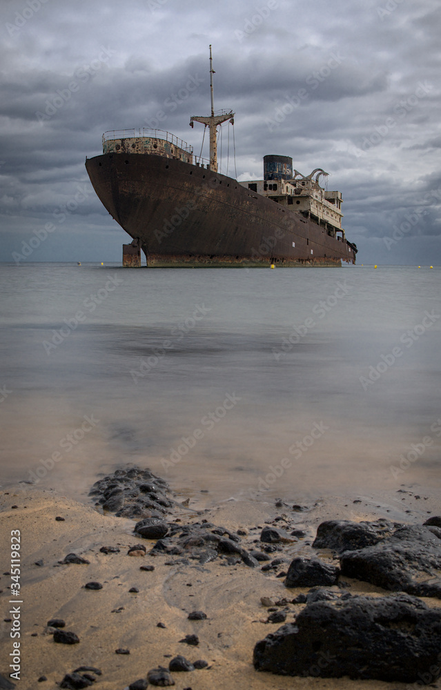 rusting sunken stranded ghost ship near the harbour of Arrecife on Lanzarote one of the Canarie Islands