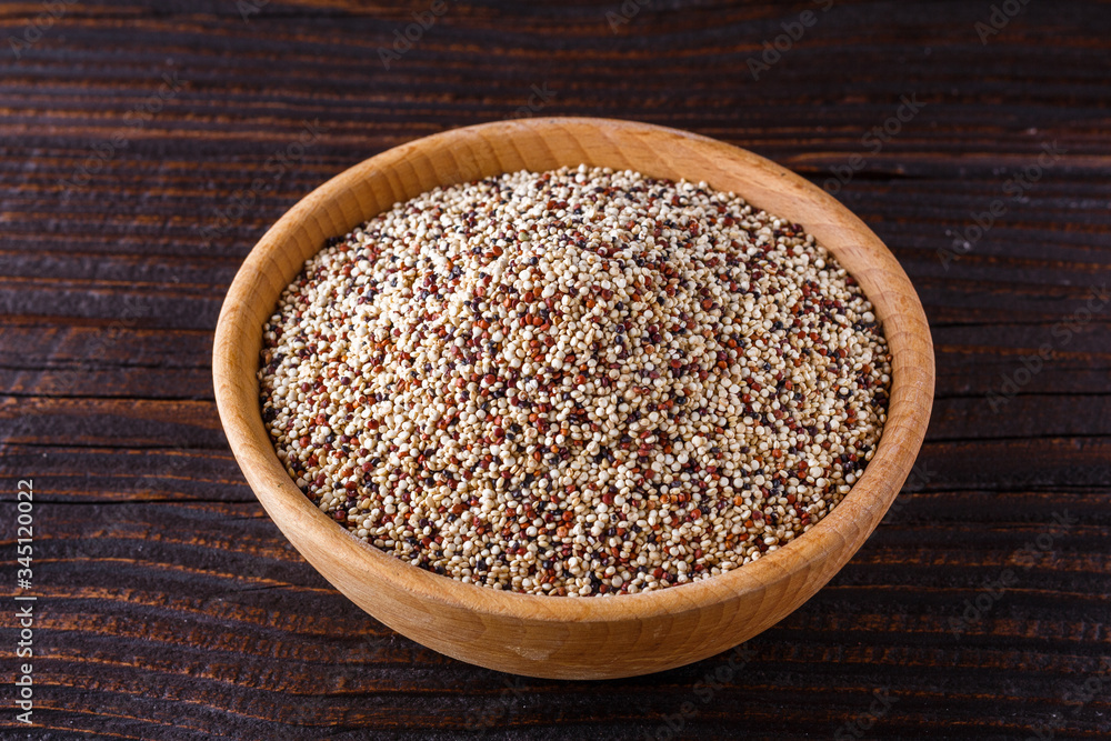 mix of quinoa grains on dark wooden rustic background mix of quinoa grains on dark wooden rustic background