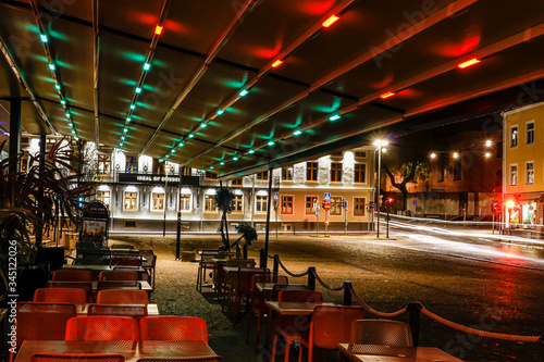 Norrkoping, Sweden  The old square or Gamla Torget at night and an empty restaurant. photo