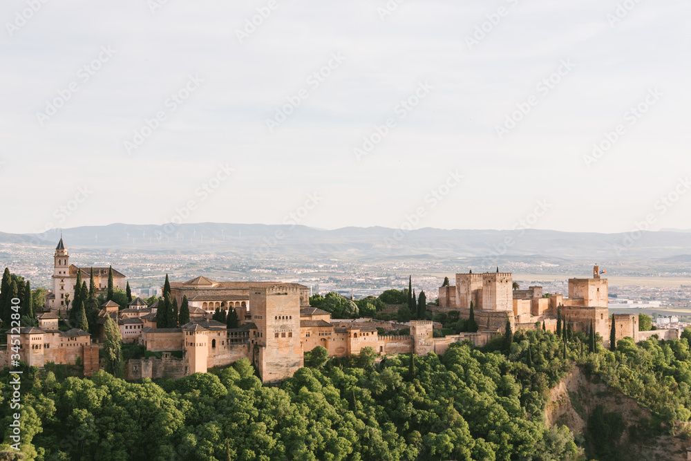 Granada, Spain. Beautiful aerial view of the Alhambra palaces with the Sierra Nevada mountains in the background.