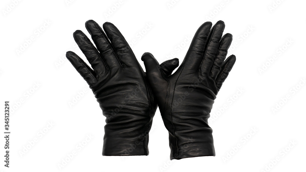 Hands wearing black leather gloves thumbs crossing, fingers pressed