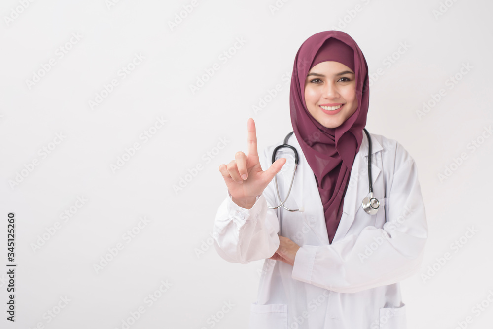 Beautiful woman doctor with hijab portrait on white background Beautiful woman doctor with hijab portrait on white background