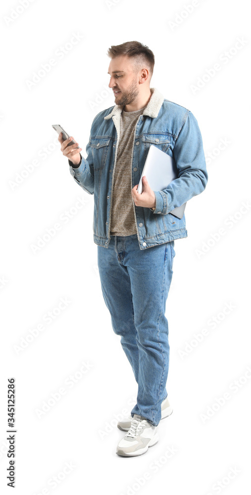 Young man with laptop and mobile phone on white background Young man with laptop and mobile phone on white background