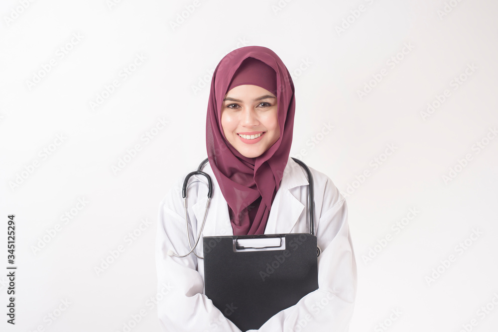 Beautiful woman doctor with hijab portrait on white background Beautiful woman doctor with hijab portrait on white background