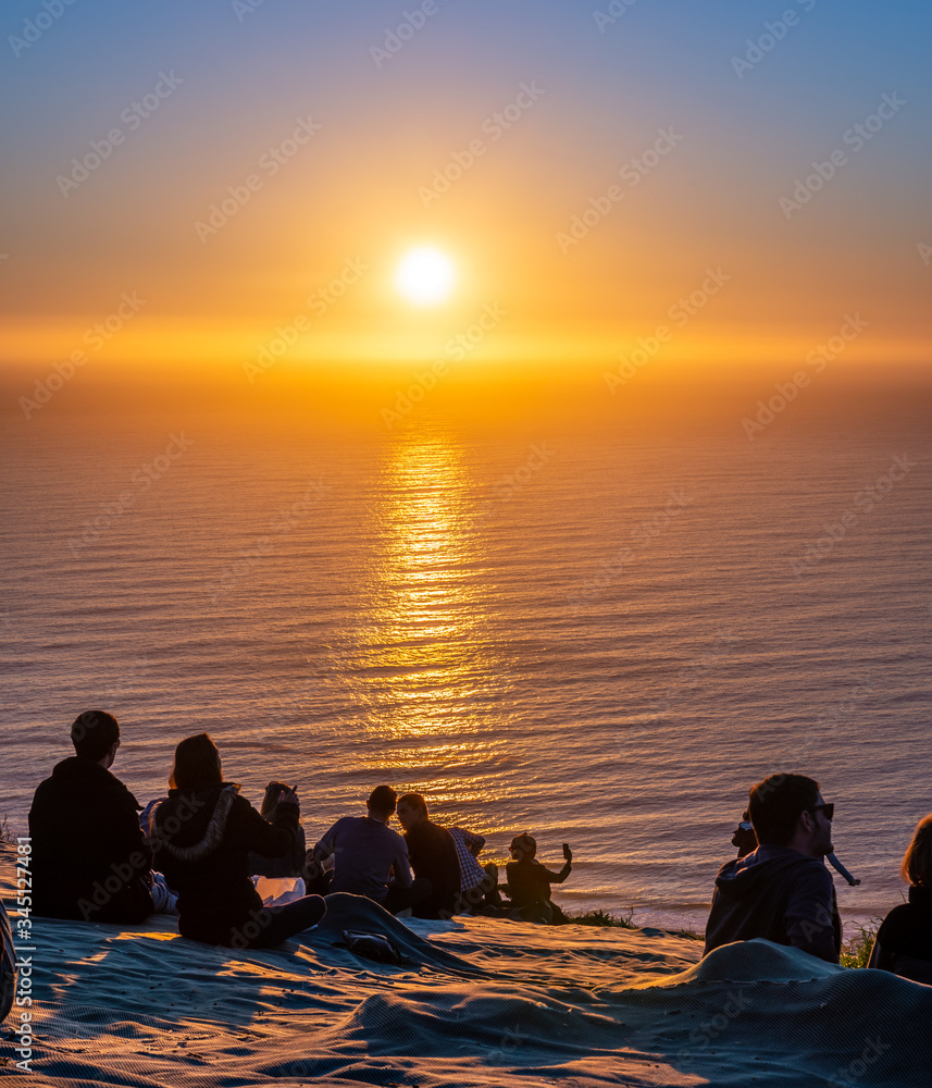 Tourists watching the sunset from Signal Hill, Cape Town (South Africa) Tourists watching the sunset from Signal Hill, Cape Town (South Africa)
