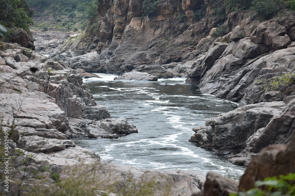 Wild river flowing between Rocks Wild river flowing between Rocks