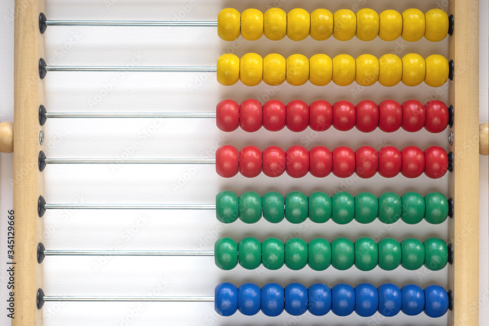 Children's toy, wooden abacus of different colors Children's toy, wooden abacus of different colors