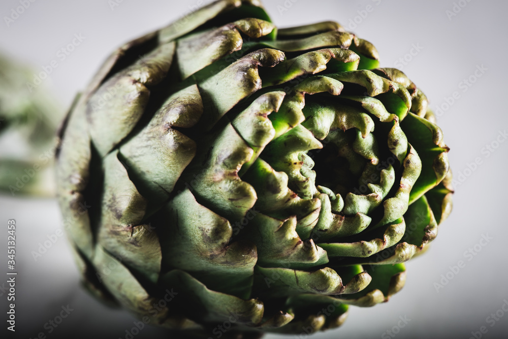 Fototapeta premium Close-up of fresh artichoke on white background