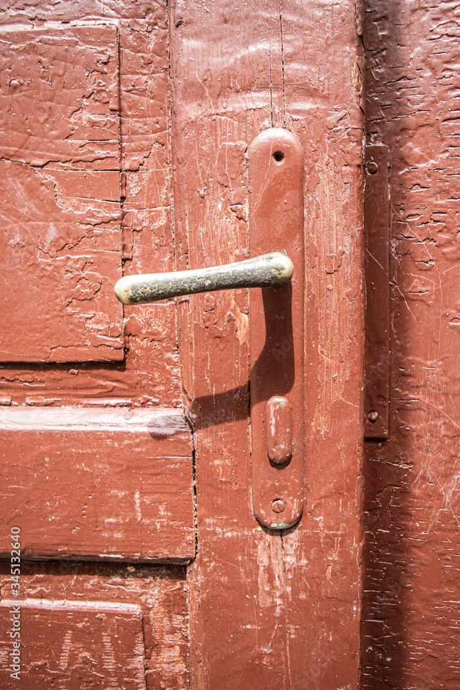 old red door with lock