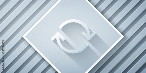 Paper cut Refresh icon isolated on grey background. Reload symbol. Rotation arrows in a circle sign. Paper art style. Vector Illustration