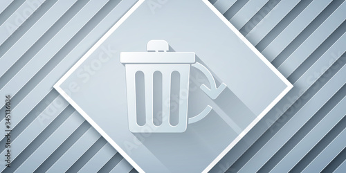 Paper cut Recycle bin with recycle symbol icon isolated on grey background. Trash can icon. Garbage bin sign. Recycle basket sign. Paper art style. Vector Illustration