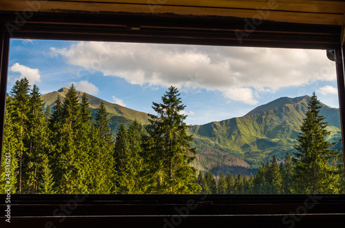 Window view from mountain shelter in Ornak hall, Tatra mountains Poland
