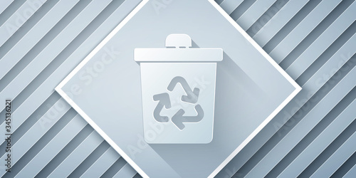 Paper cut Recycle bin with recycle symbol icon isolated on grey background. Trash can icon. Garbage bin sign. Recycle basket sign. Paper art style. Vector Illustration