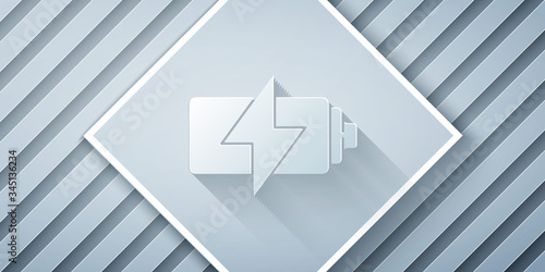 Paper cut Battery icon isolated on grey background. Lightning bolt symbol. Paper art style. Vector Illustration