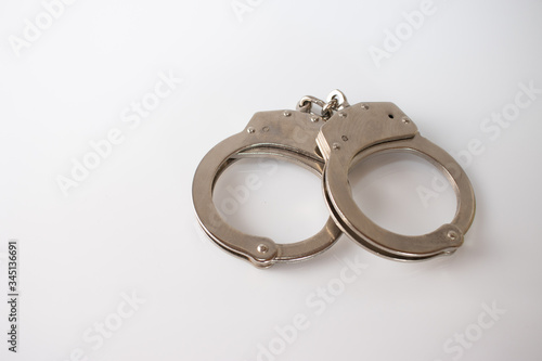 steel metal Handcuffs on white background isolate