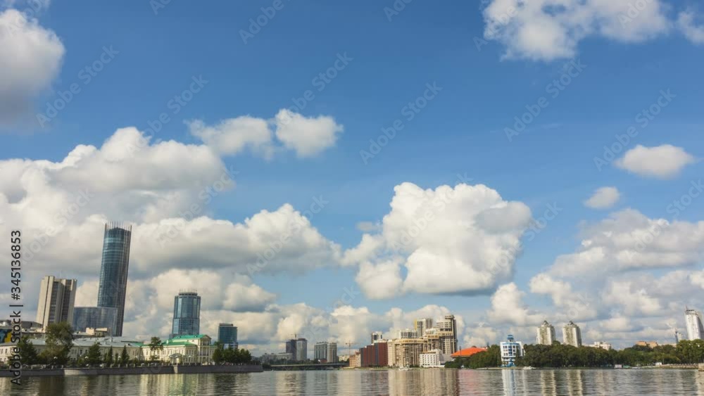 Timelapse of cloud movement. Panorama of the sights of Yekaterinburg. View from the Iset river embankment. 4K Timelapse of cloud movement. Panorama of the sights of Yekaterinburg. View from the Iset river embankment. 4K