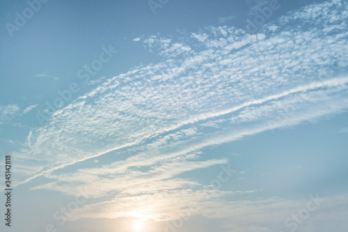 The blue sky cloud with a white panorama in the morning and the soft light of the morning is perfect as a background. 