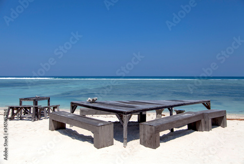 beach exotic chairs on a tropical beach, gili trawangan island, Bali, Indonesia.