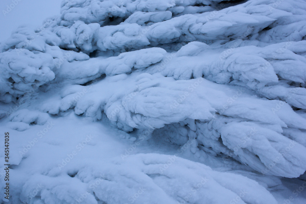 Ice texture of frozen snow winter pattern
