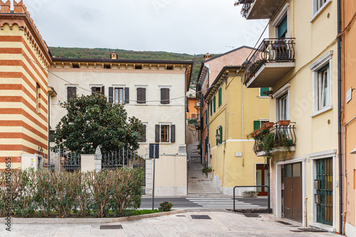 Old buildings on the shores of Lake Garda in Lazise town, in Veneto, northern Italy