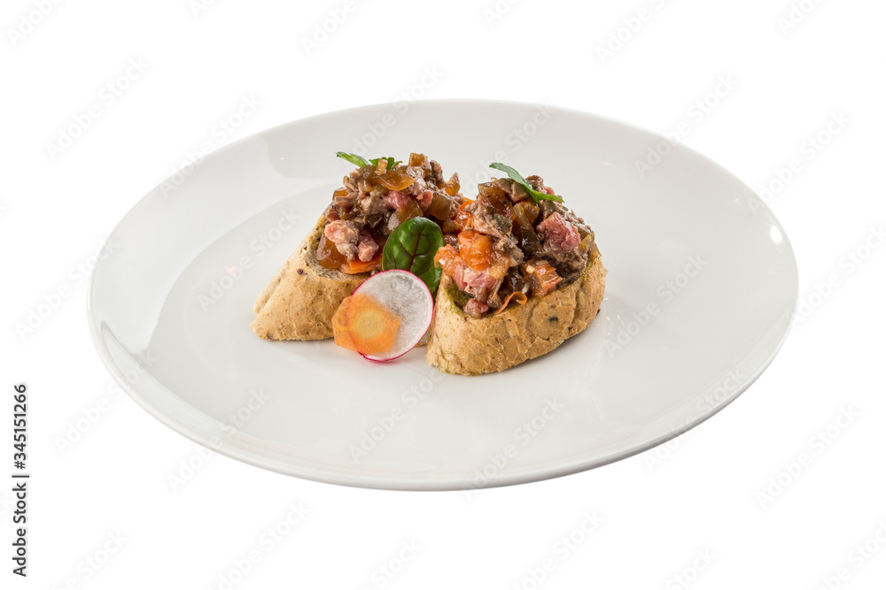 chopped roast beef with onion on bread toast bruschetta on white plate isolated on white background chopped roast beef with onion on bread toast bruschetta on white plate isolated on white background