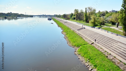 Fototapeta Naklejka Na Ścianę i Meble -  The promenade at the bank of river