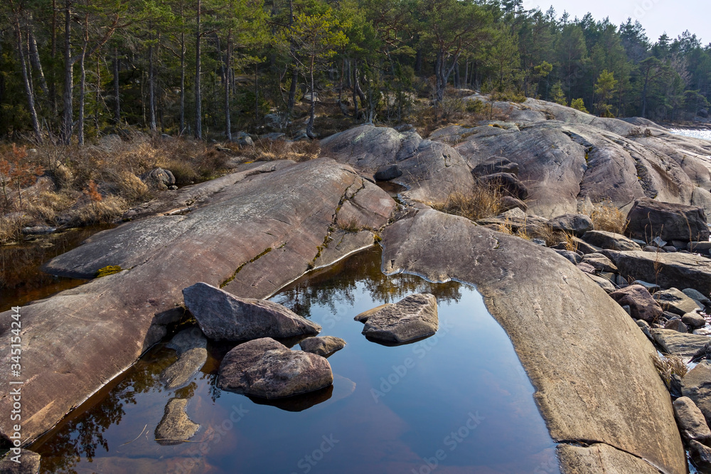 On the western Swedish archipelago coast. The stones are cut by the glacier.