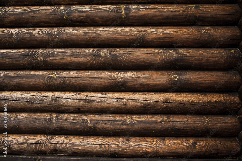 brown rustic wooden texture background. facade of a log house, copy space brown rustic wooden texture background. facade of a log house, copy space