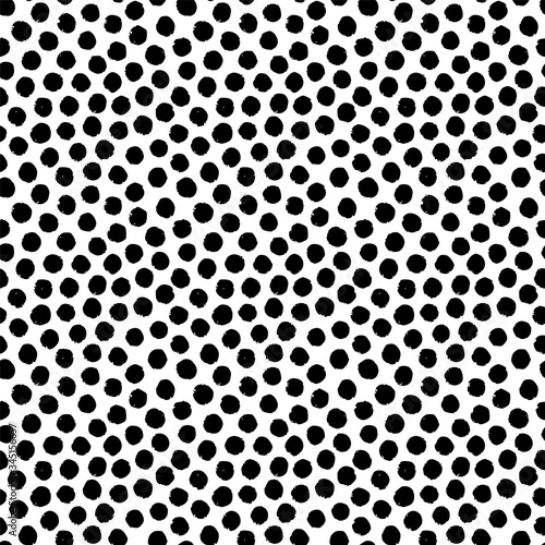 Hand-drawn black and white seamless texture with circles and dots. Vector repeat pattern.