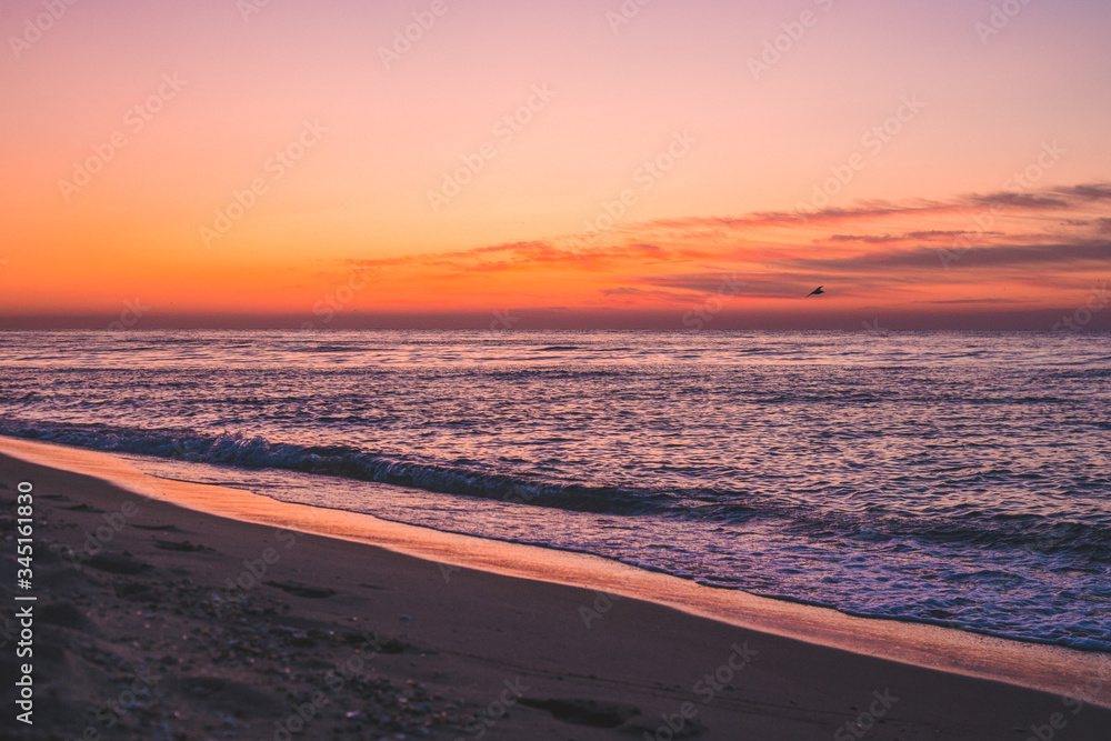 amazing sunrise sea in the summer or early autumn