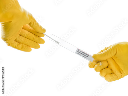 COVID-19 laboratory analysis. A swab from the nasopharynx. Coronavirus testing. Pharynx scraping. photo