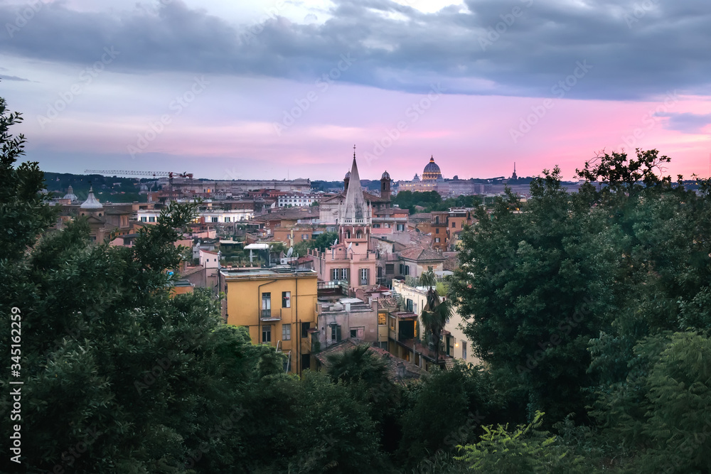 View across Rooftops of Rome and St Peter's at Sunset, Rome, Italy