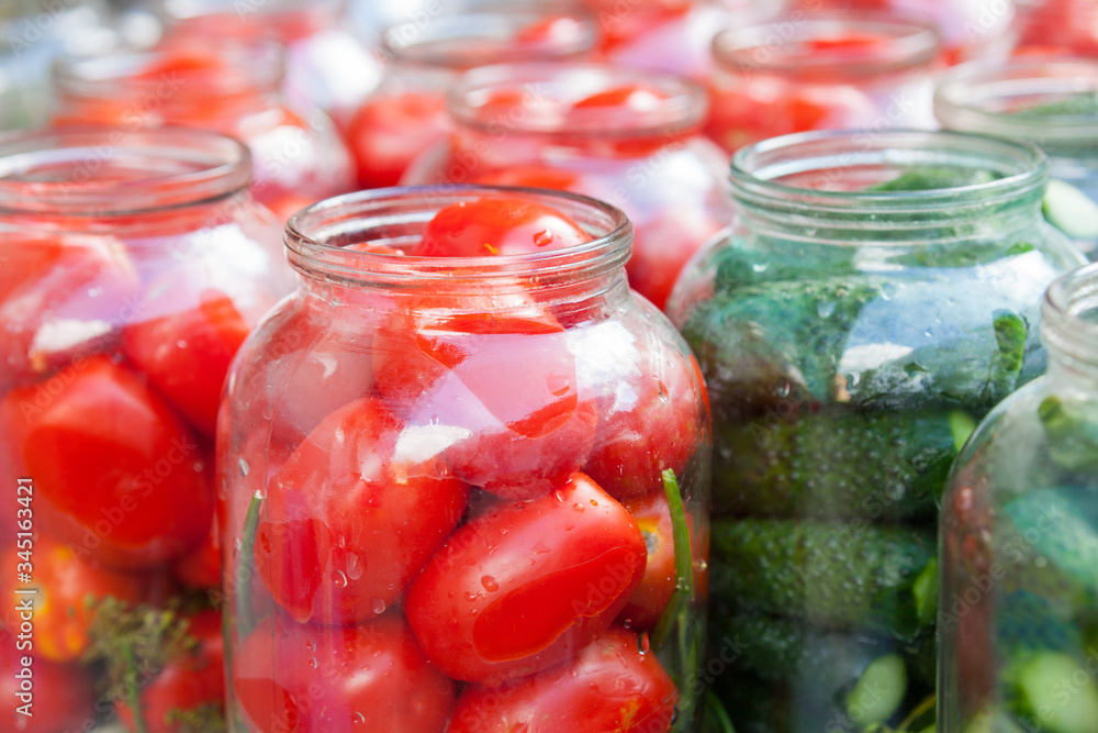 Pickling (canning) tomatoes and cucumbers. Pickling (canning) tomatoes and cucumbers.