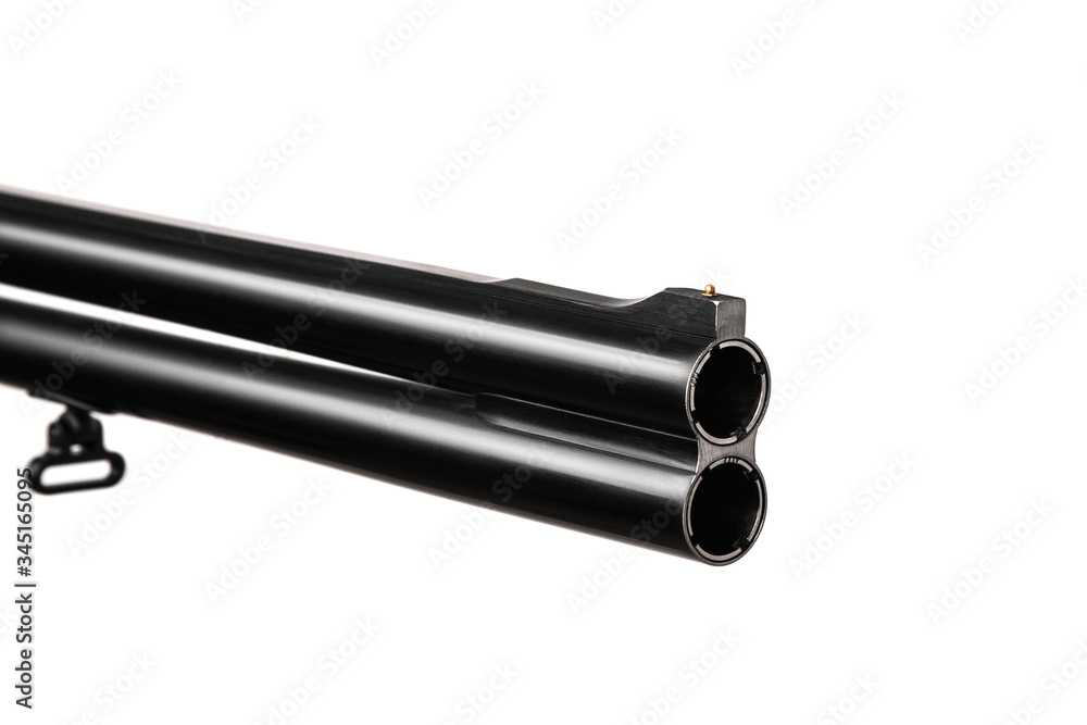 Classic double-barrell smooth-bore hunting rifle isolated on white background. Weapons for sport and hunting. Classic double-barrell smooth-bore hunting rifle isolated on white background. Weapons for sport and hunting.
