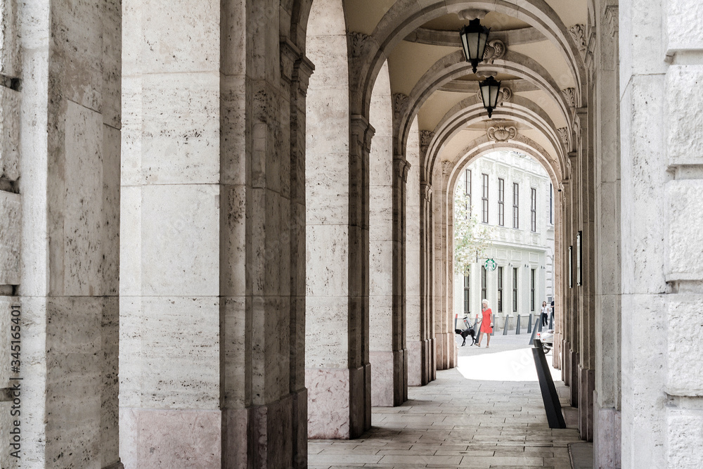 Budapest, Hungary. . Historic building, facade with columns and arched windows.