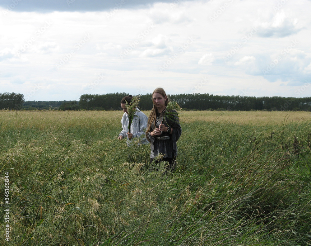 mother and daughter in field mother and daughter in field