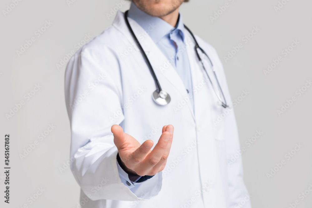 Unrecognizable Male Doctor Holding Virtual Object In His Hand, Cropped Unrecognizable Male Doctor Holding Virtual Object In His Hand, Cropped
