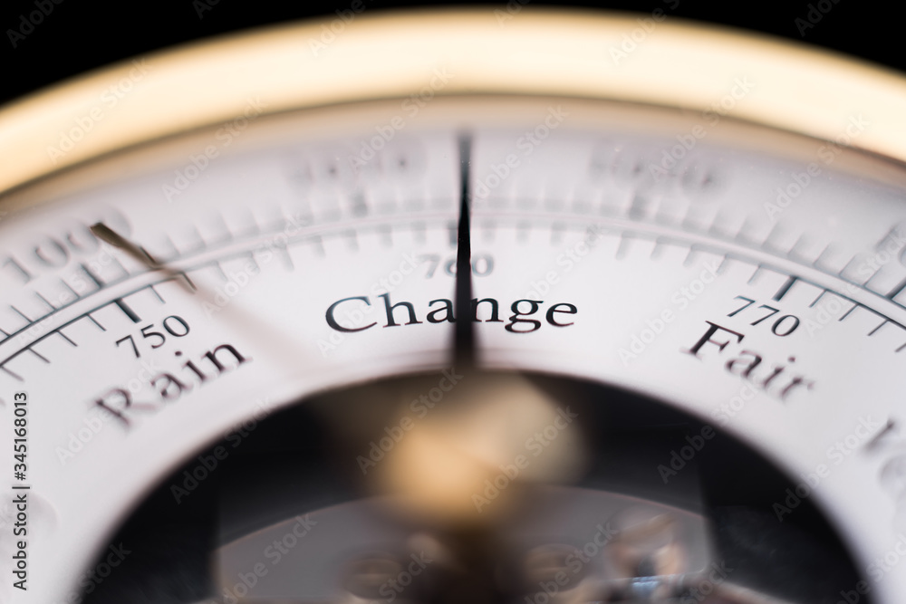 needle of a barometer pointing at the word change. close up of the word needle of a barometer pointing at the word change. close up of the word