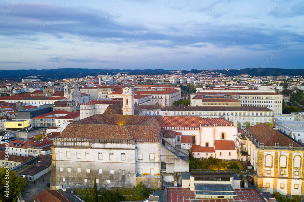 Coimbra drone aerial of beautiful buildings university at sunset, in Portugal