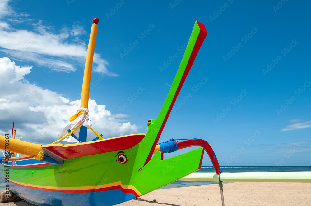 Jukung fishing boats on beach at Sanur Bali Indonesia Jukung fishing boats on beach at Sanur Bali Indonesia