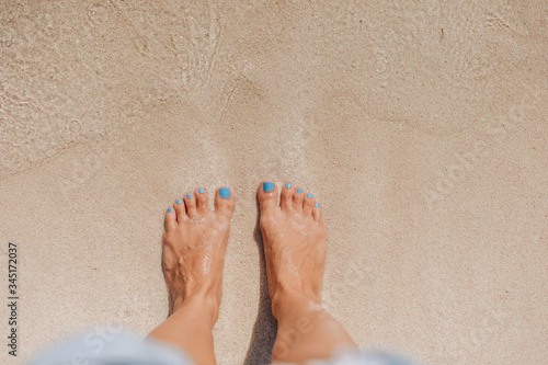 feet on the beach