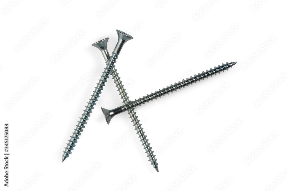 Three long self tapping iron screws with flat head, macro close-up isolated on white background. Three long self tapping iron screws with flat head, macro close-up isolated on white background.