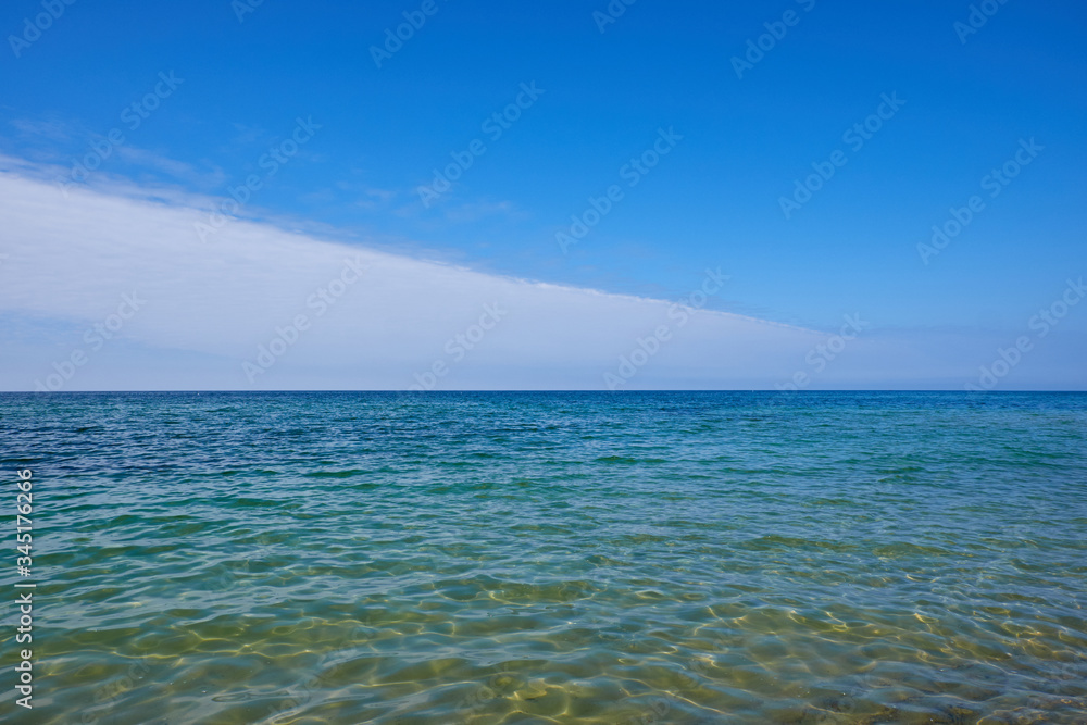Blue sky and blue water at the Baltic sea