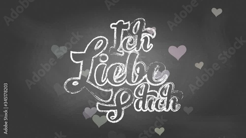 german i love yourself ich liebe dich written with chalk using curly offset over a black chalkboard suggesting message left by intimate photo