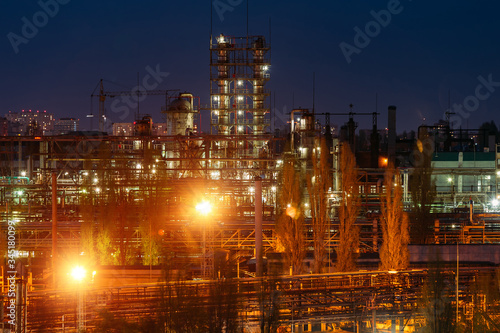 Chemical factory at summer night. Rectification towers © Mulderphoto