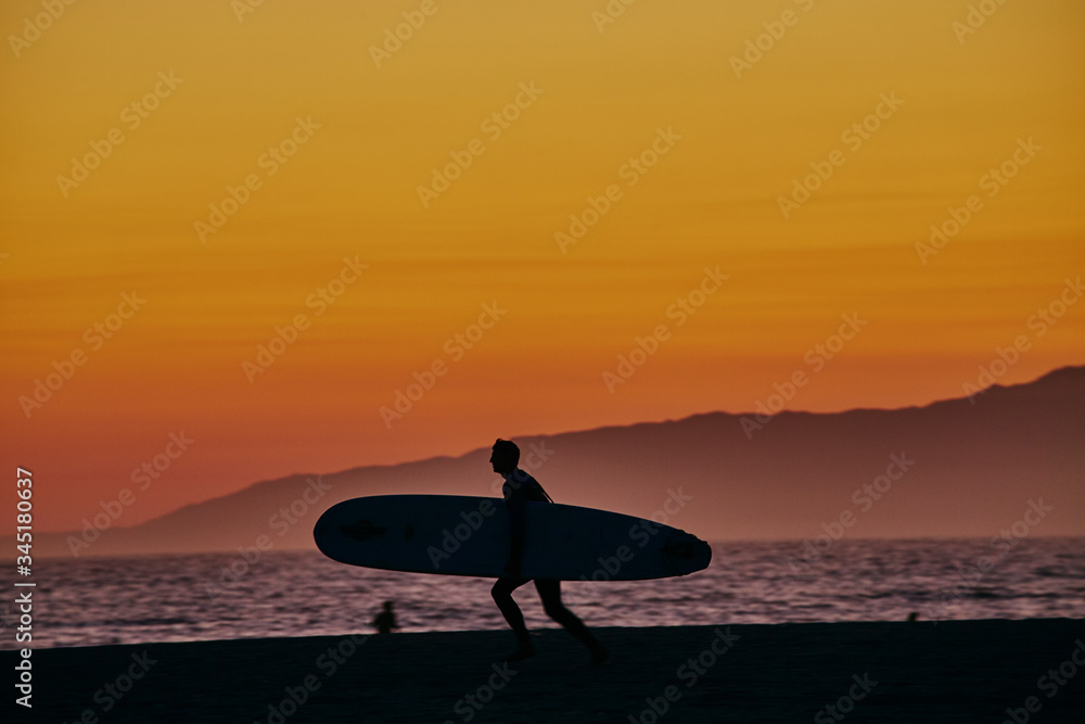 Sunset surfer California