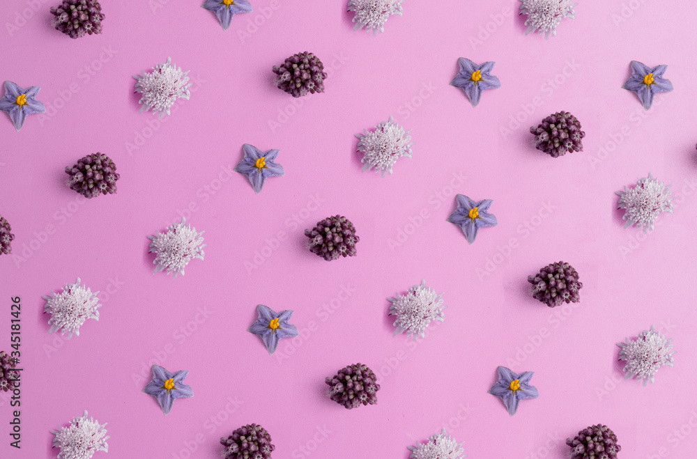 repeating flowers on a pink background repeating flowers on a pink background